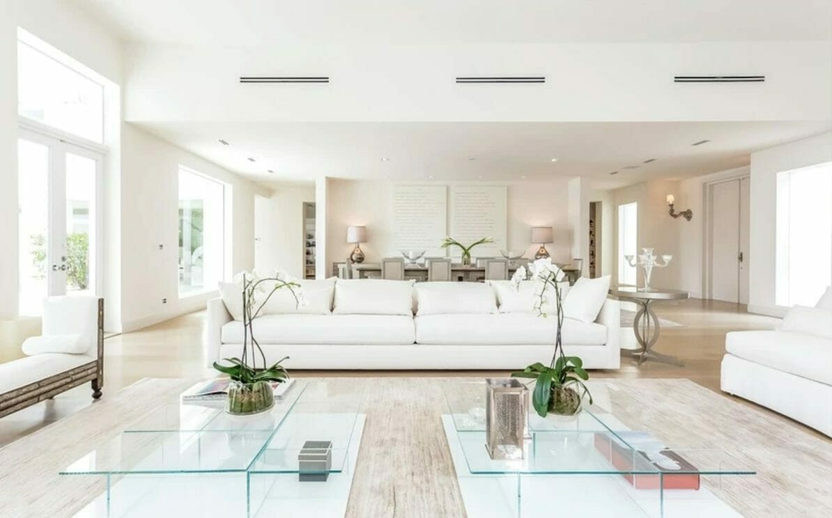 Bright white contemporary living room by top interior decorator miami