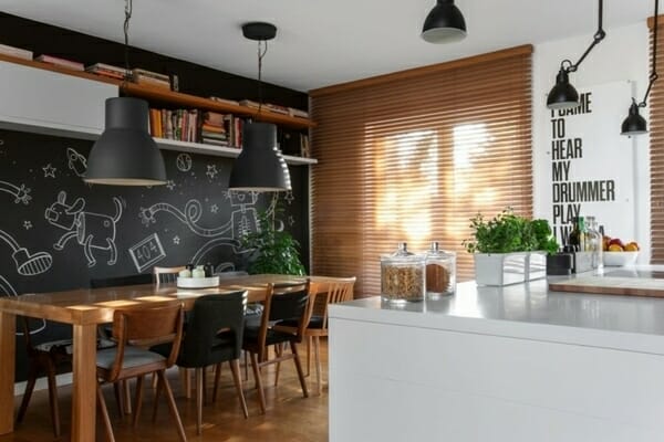 modern-kitchen-chalkboard-wall-ideas-solid-wood-dining-table-white-cabinets