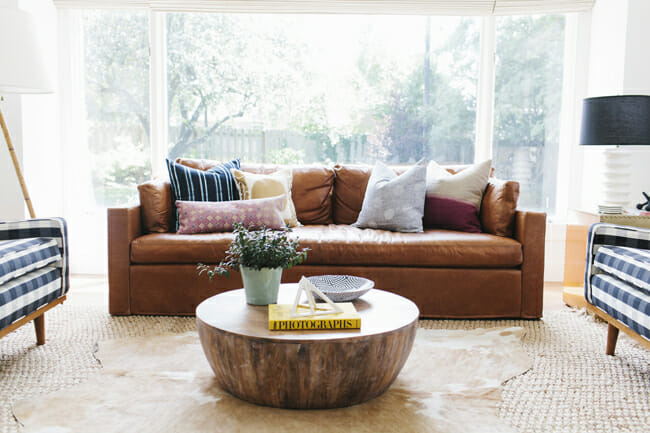 layering-rugs-cowhide-over-jute-Studio-McGee