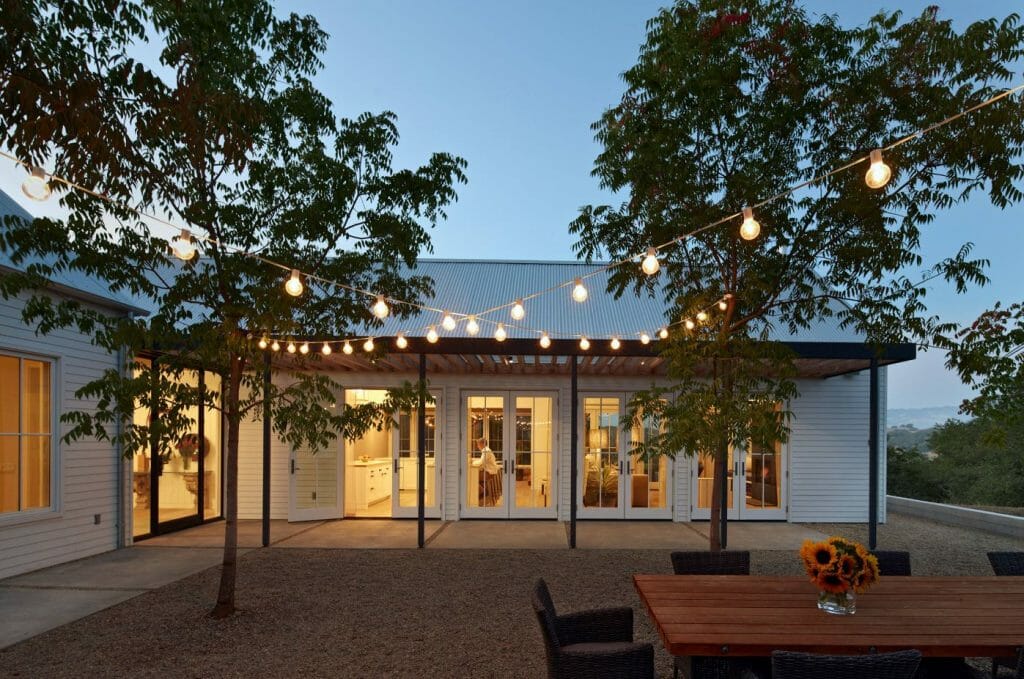 top backyard lighting trends cafe lighting over dining