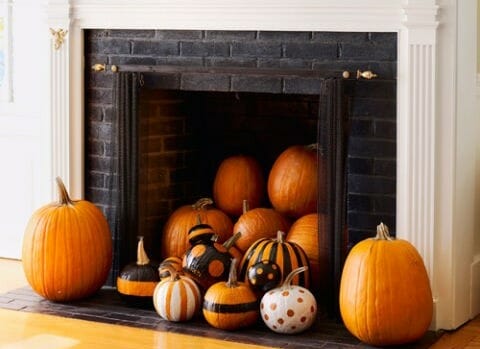 halloween decor trends fireplace pumpkins