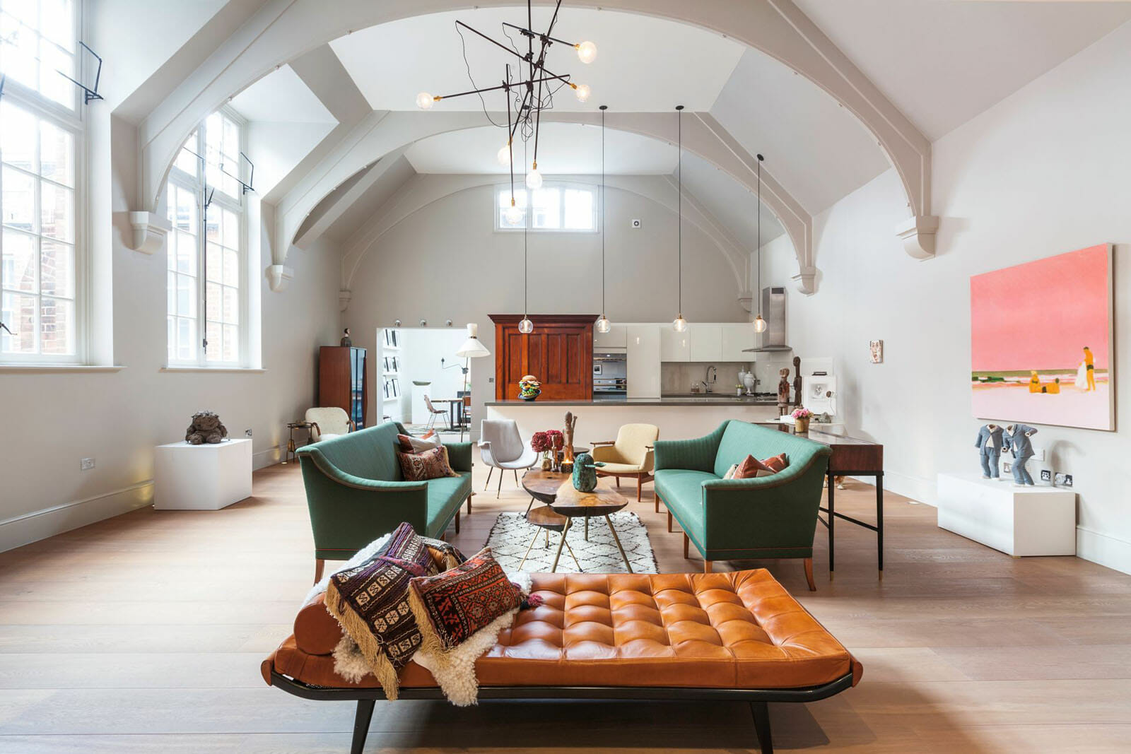 Eclectic Living Room With Leather Lounger And Green Couches Decorilla Eclectic Living Room With Leather Lounger And Green Couches