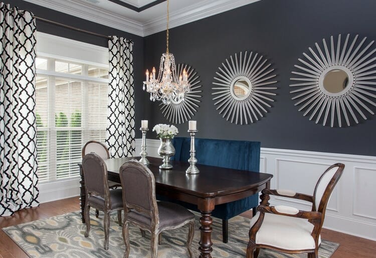 transitional dining interior with contemporary art and classic furniture