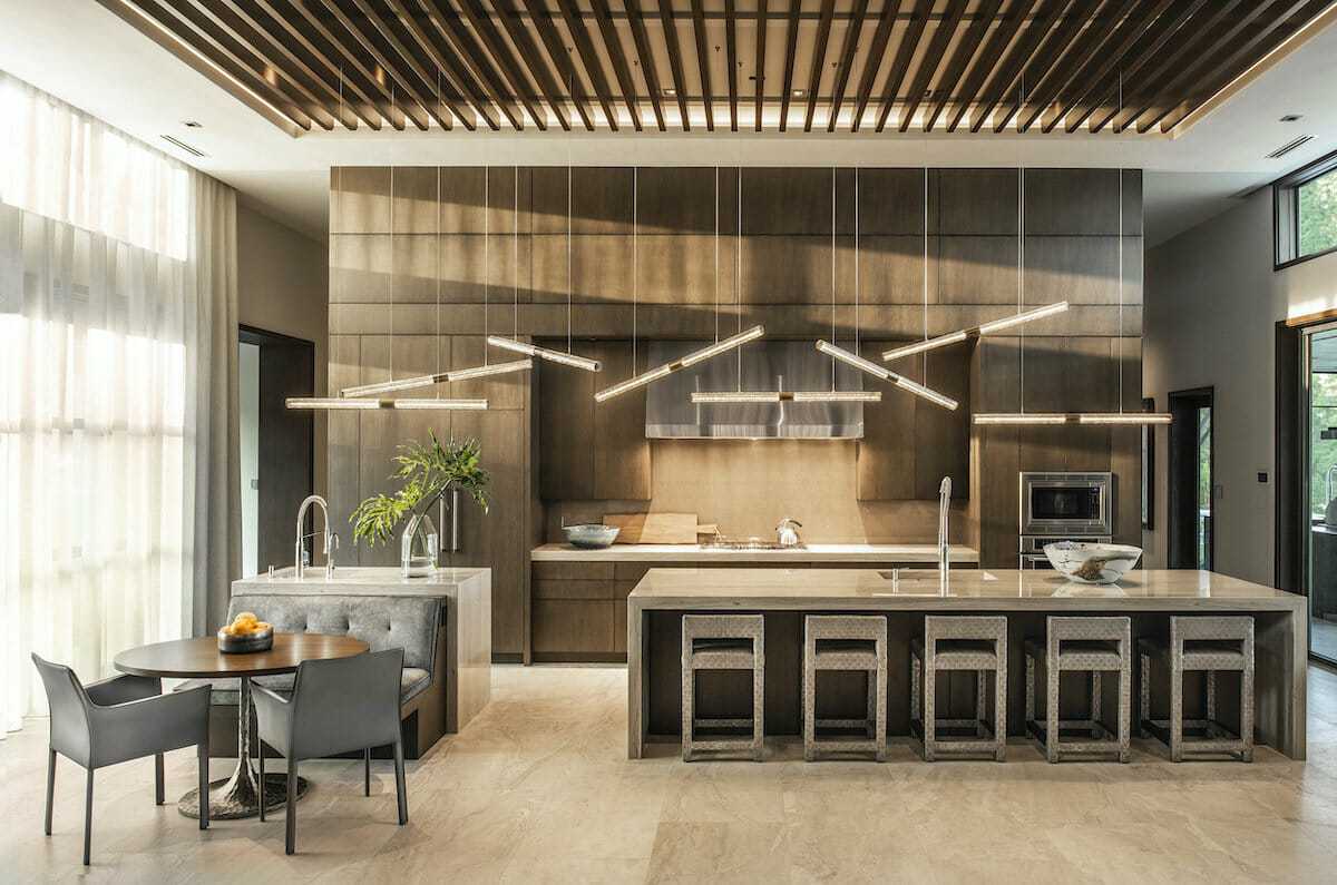 warm modern kitchen and dining by interior decorators in orlando ansana