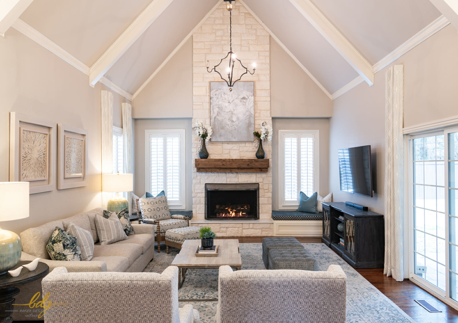 Transitional living room with fireplace by one of the best dallas interior designers