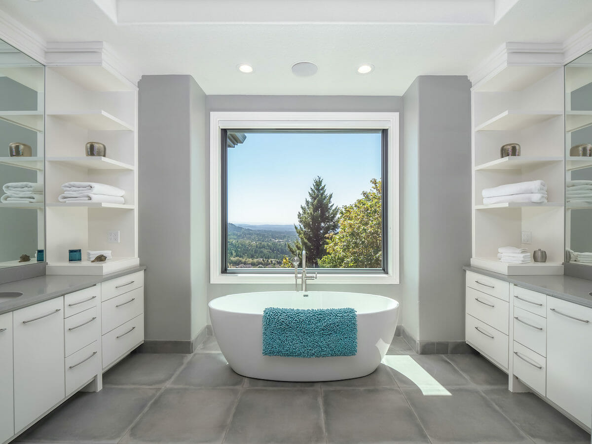 relaxing master bath with a view by interior decorators portland - allison smith design
