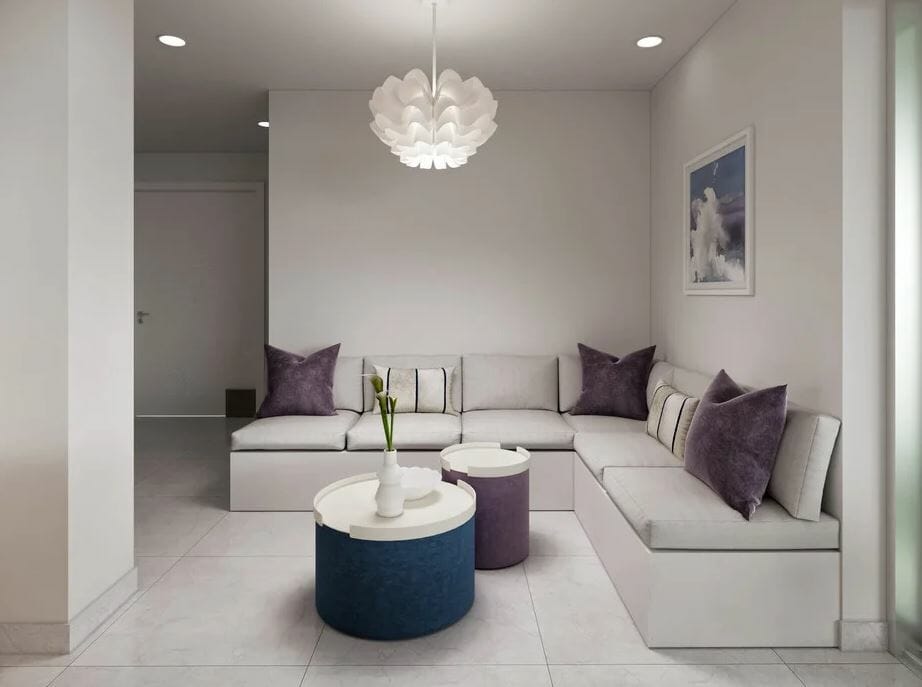 modern condo living room design with a contemporary light fixture