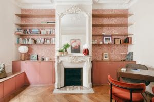 Pink home decor and furniture in a living room by Decorilla designer, Sandra B.