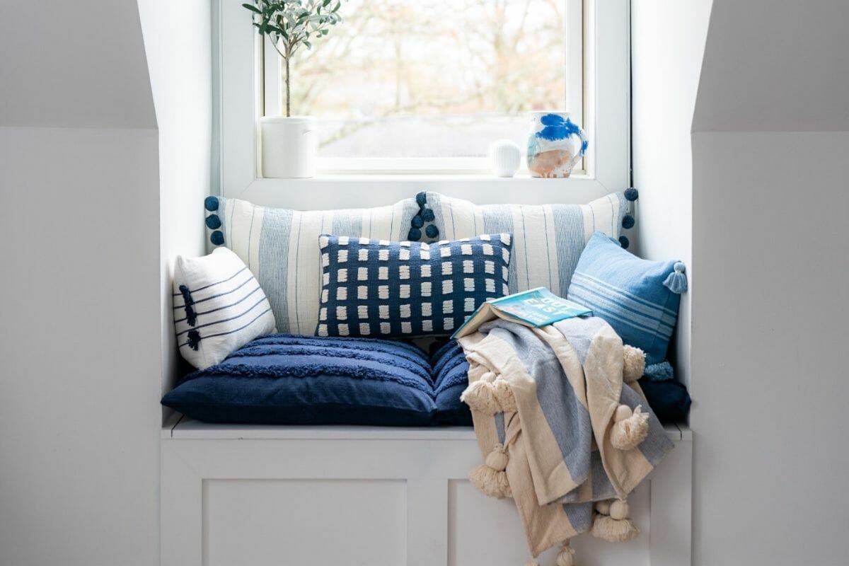Calming reading nook in blue and white, perfect for a happy home design