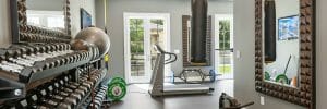 Stylish home gym ideas by Decorilla interior designer, Lori D