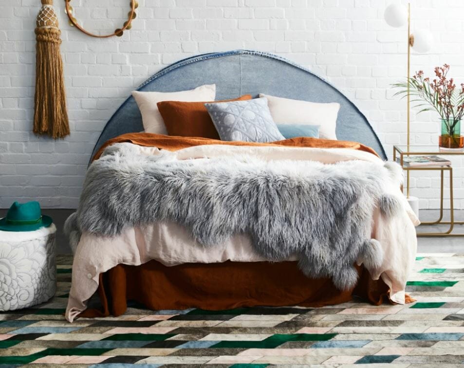 Cow hide rug styled in a desert bohemian bedroom by Julia Green