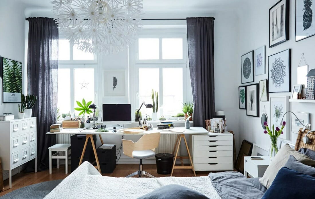 Scandinavian-inspired study area in a bedroom in greys and blues by iKea