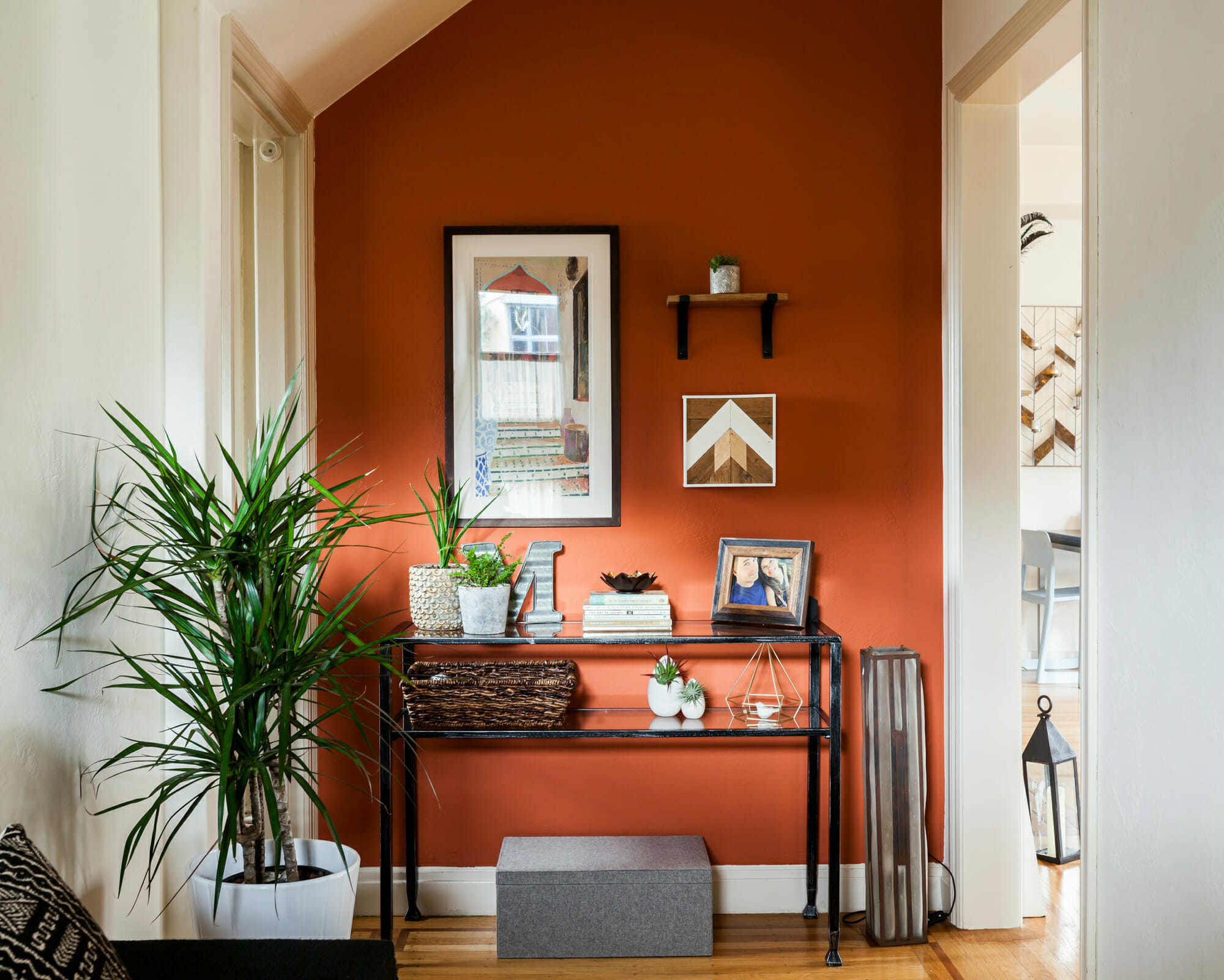 Entryway design in burnt orange fall color theme by Decorilla designer, Christine M.