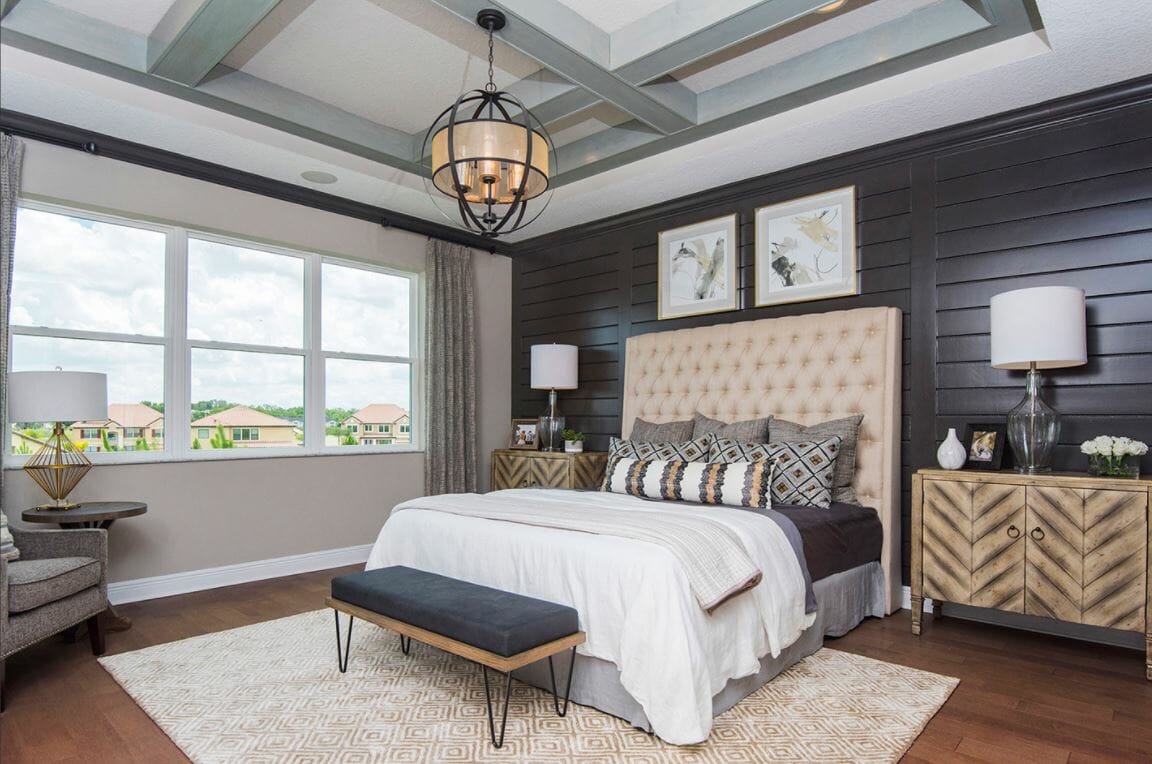 transitional small guest bedroom with wood panel backsplash - masterpiece interiors