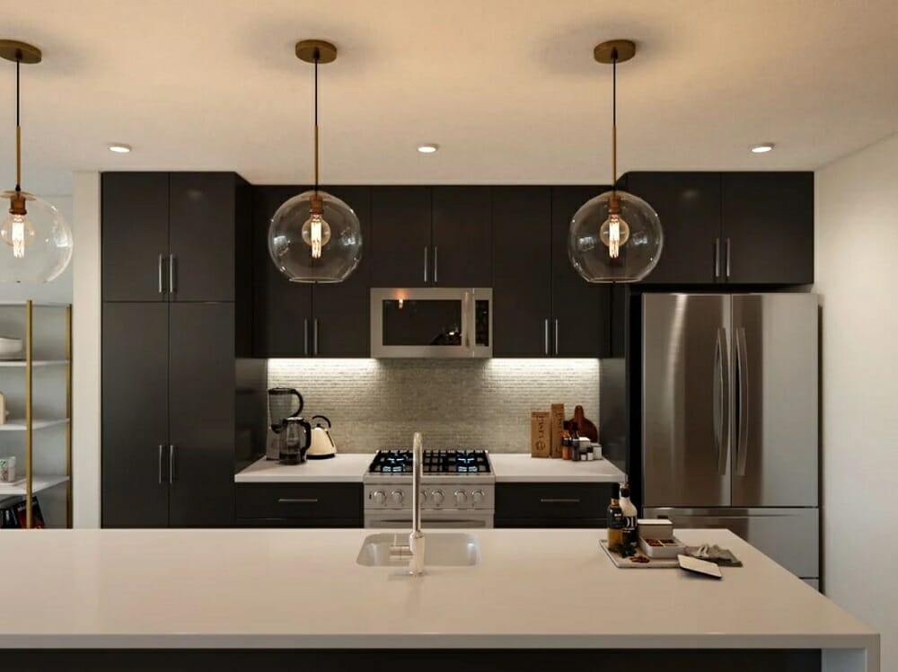 Modern open concept kitchen with black cabinets