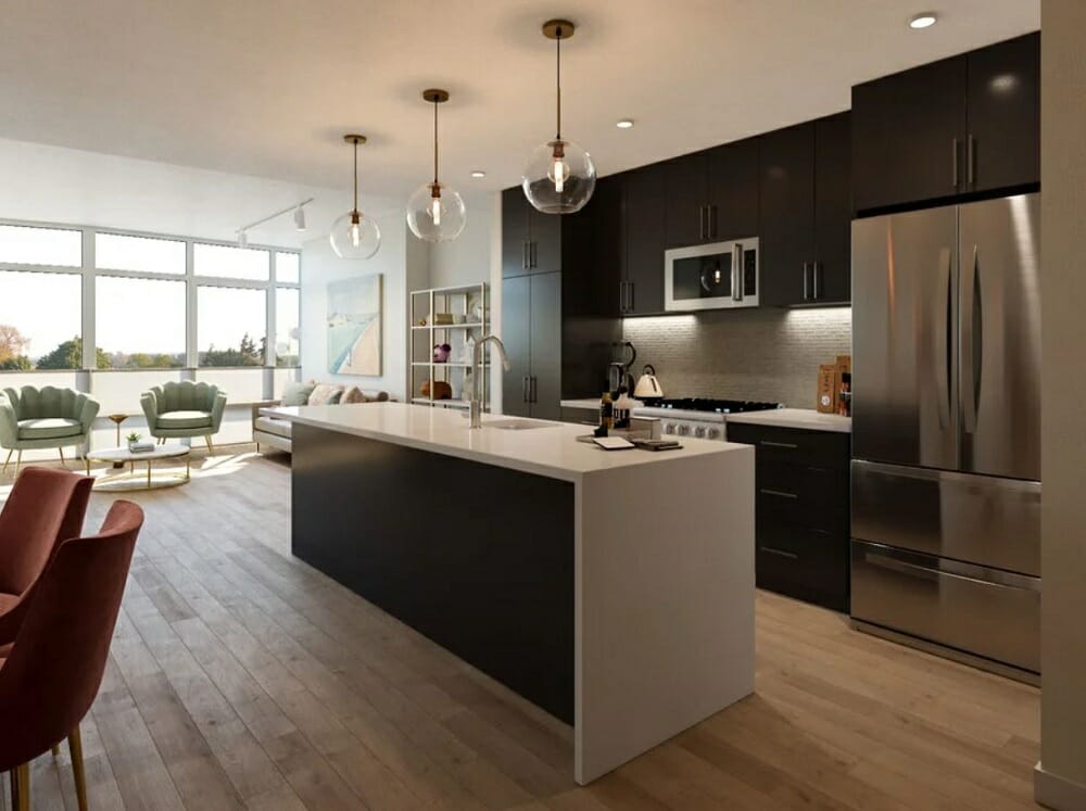 Open kitchen and living room with a dining area and black kitchen cabinets