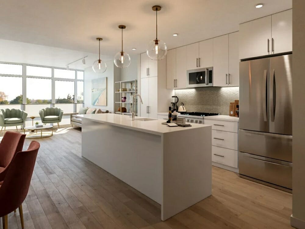 Open kitchen and living room with a dining area and white kitchen cabinets