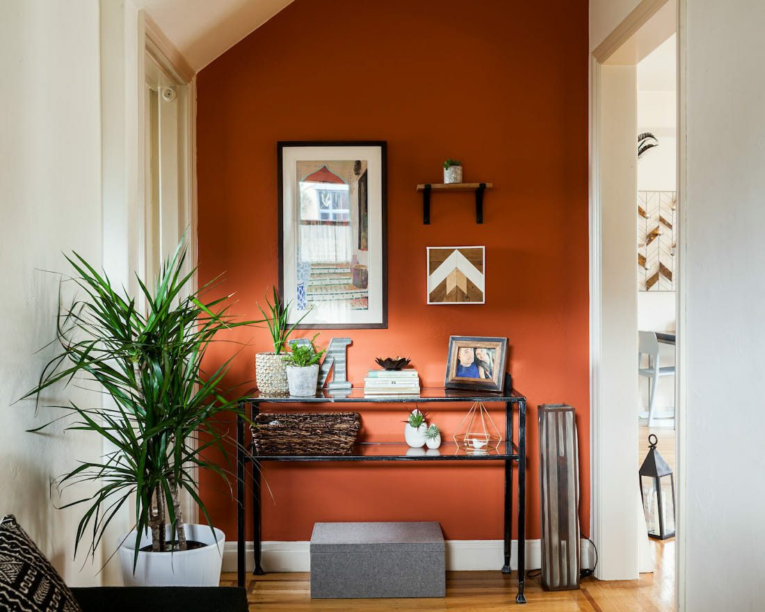 Bold entryway with Orange accent wall