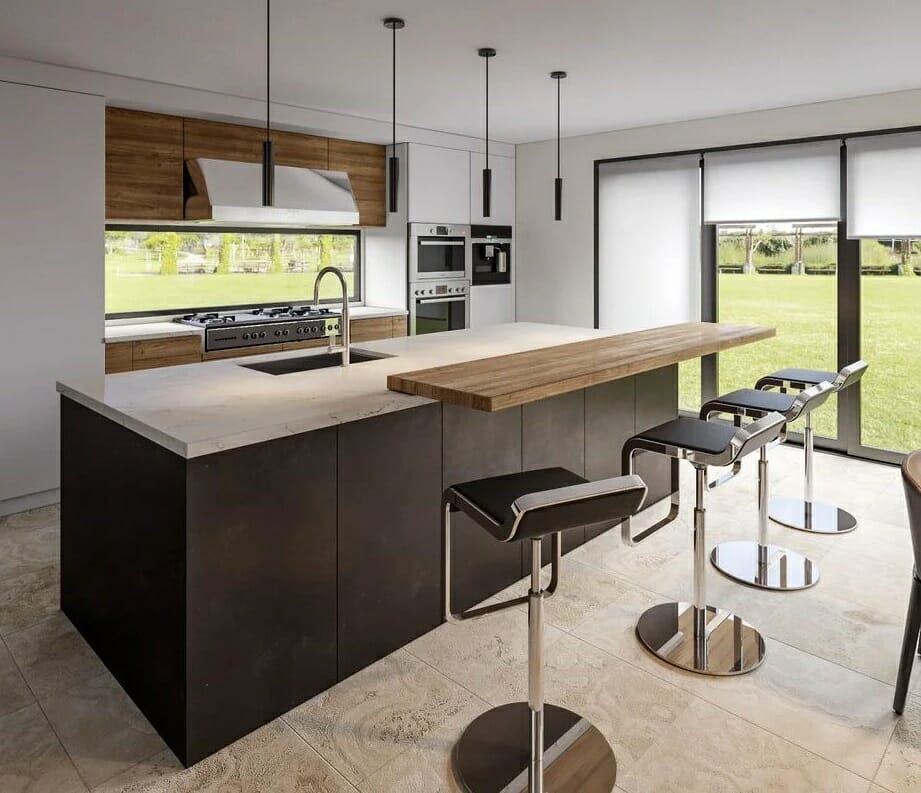 Contemporary kitchen addition with a view of the backyard