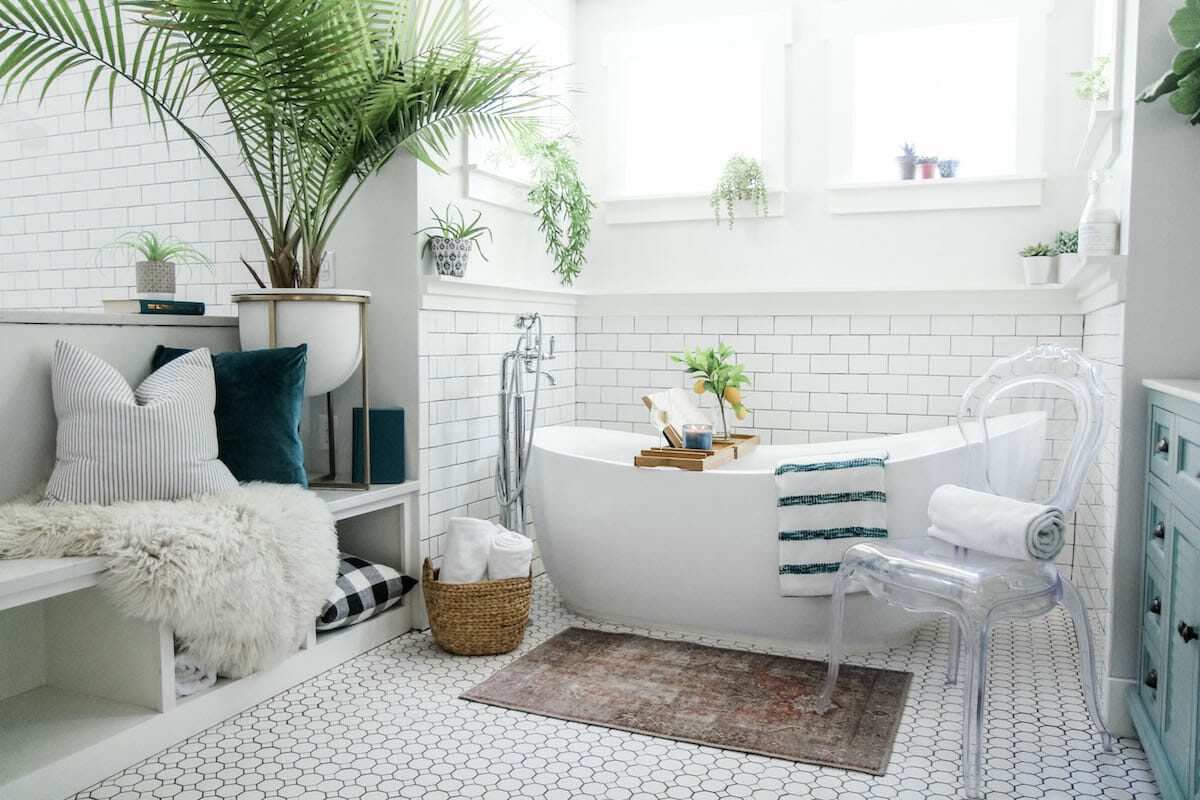 Lush coastal bathroom by one of the top raleigh interior designers casey h