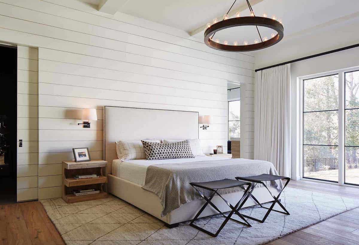modern farmhouse bedroom with painted beams