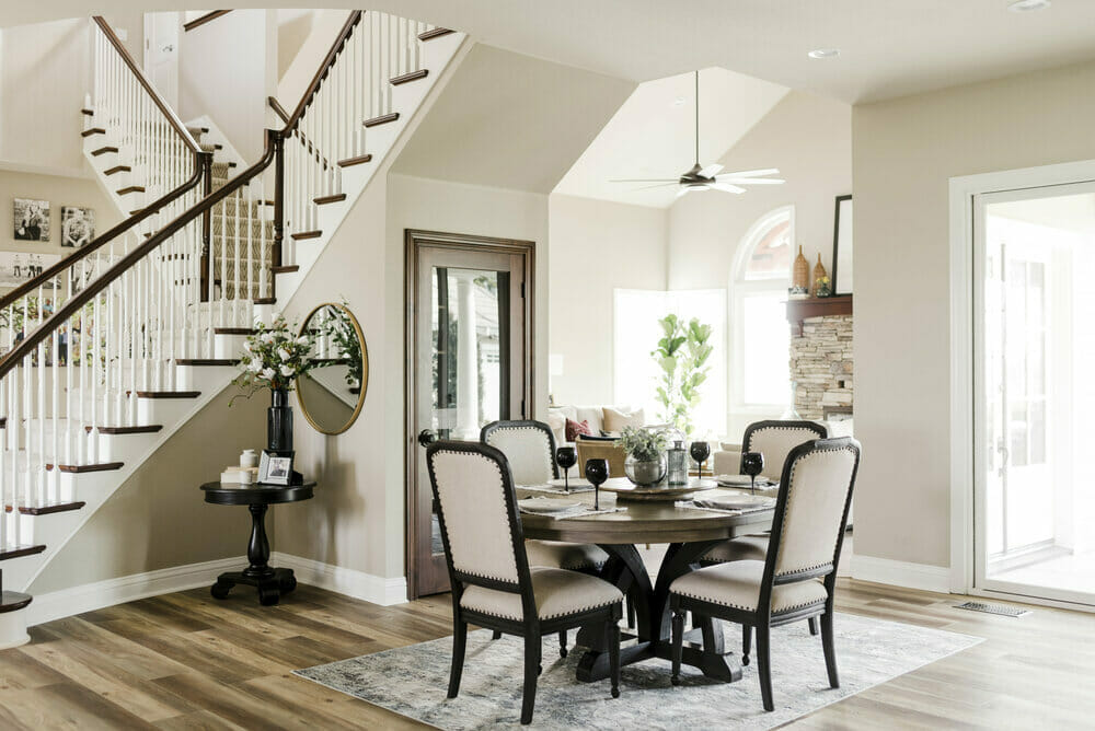 transitional dining and stairway by top fresno interior decorator parcel house