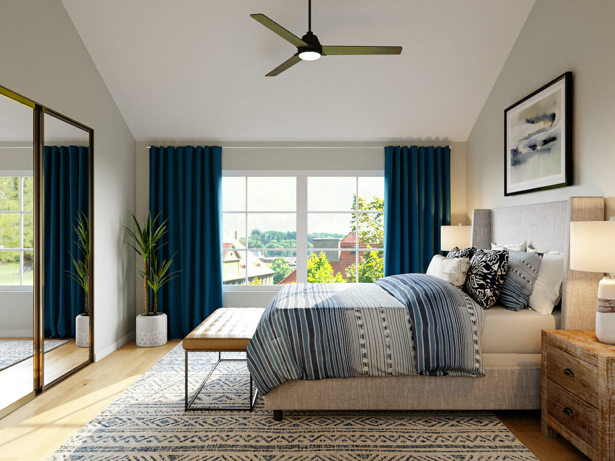Blue accented transitional master bedroom by Casey Hardin