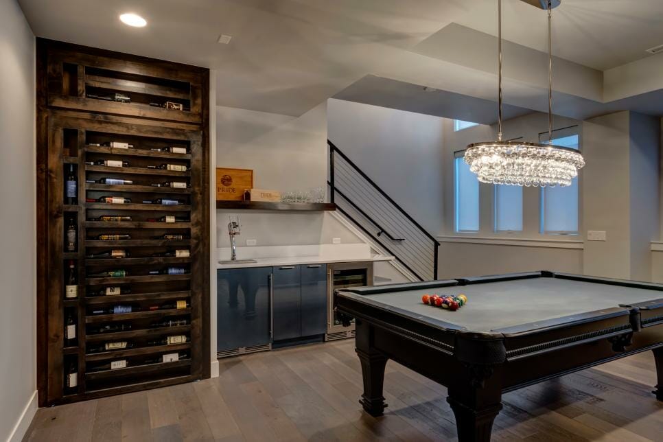 Basement designs with a bar and games area - HGTV