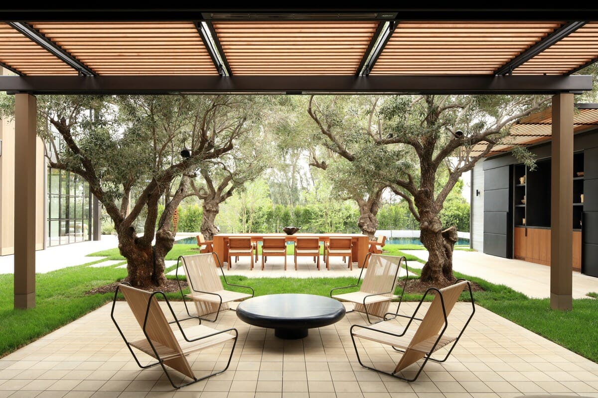 Modern pergola design with sleek outdoor furniture