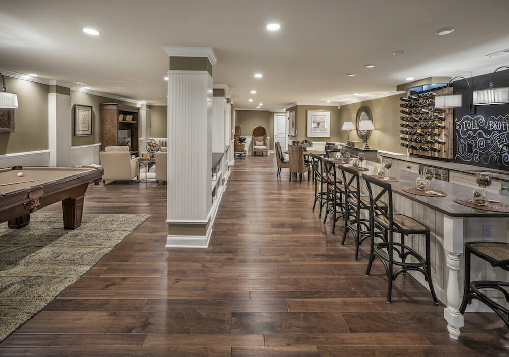 Traditional basement designs with a bar and pool table