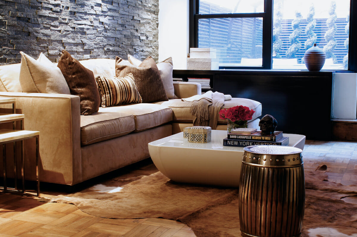 Natural hide rug placement in a living room