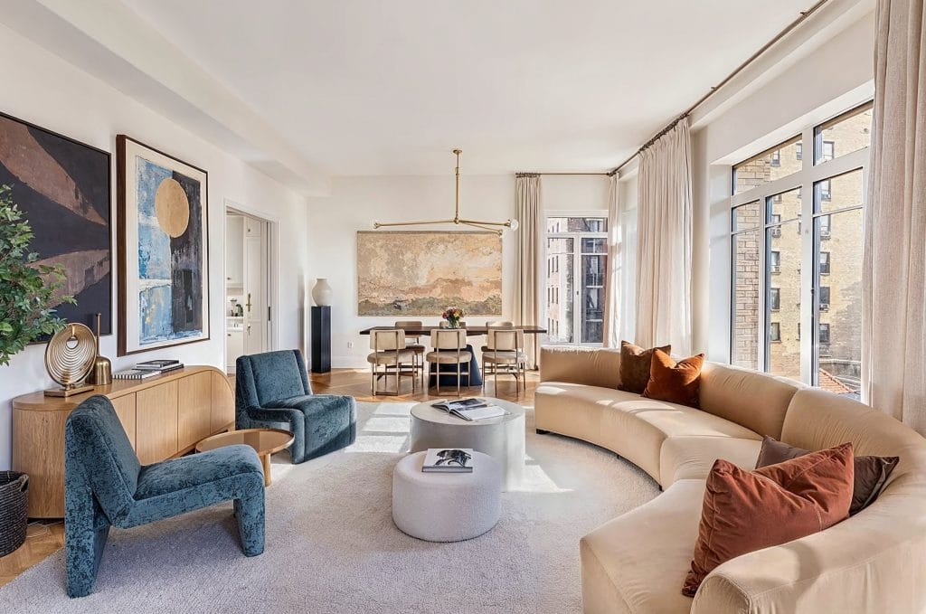 How to hang curtains like in this earthy living room by Decorilla designer, Leanna S.