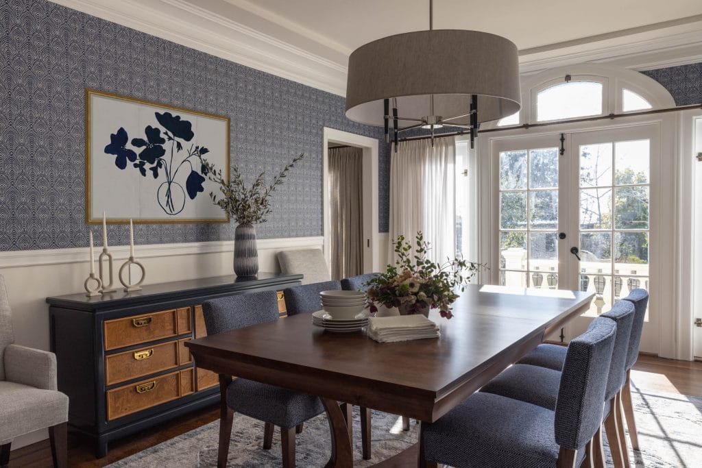 Transitional dining room with wallpaper by Decorilla designer, Dana H.