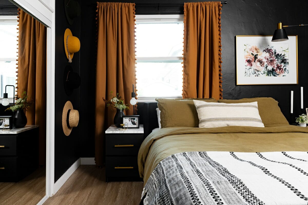 Black bedroom interior design with a sheen dark paint