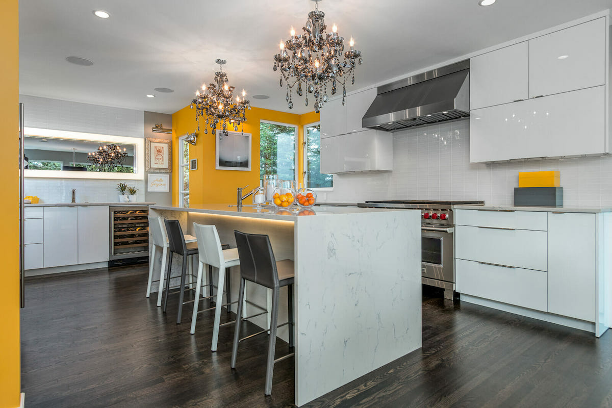 Statement chandelier in a high-end kitchen by Decorilla designer betsy m