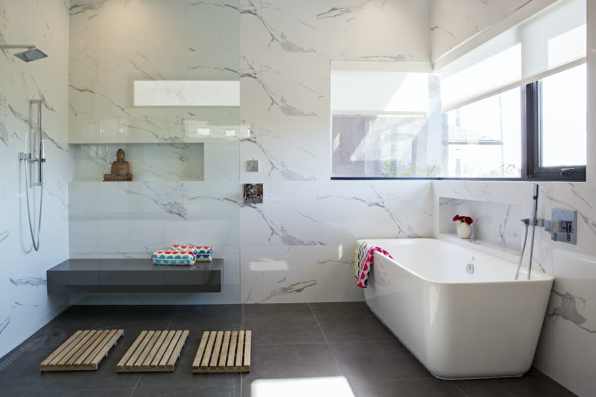 Contemporary marble tile bathroom by Decorilla designer Lori D