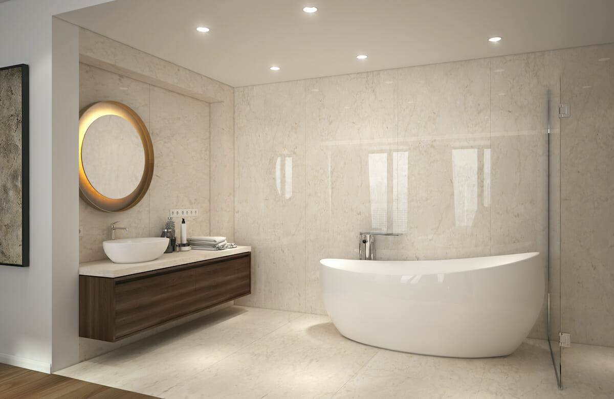 Master bathroom with a freestanding tub by Decorilla designer Milana M