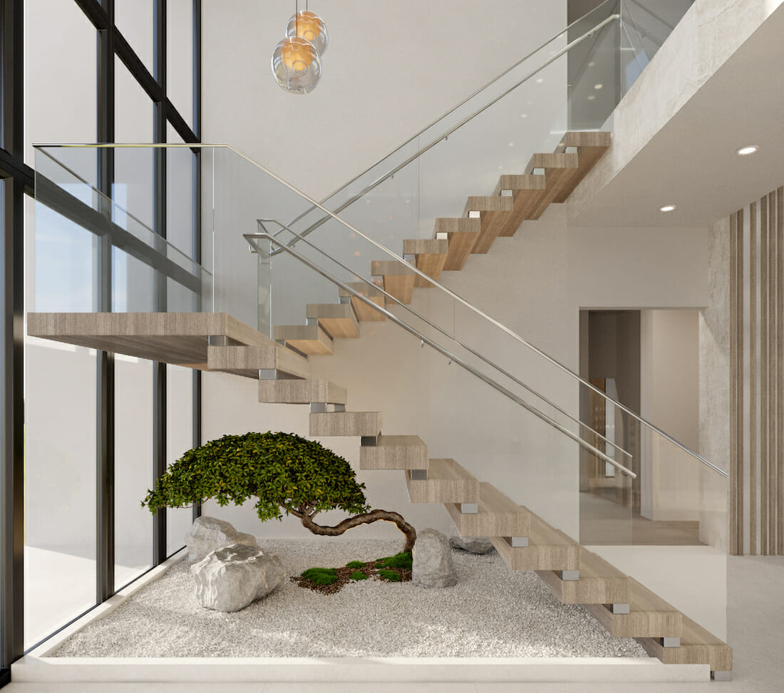 Decorating a staircase landing with a zen garden by Decorilla designer, Laura A.
