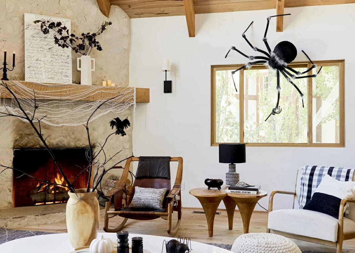Decorating for Halloween starts with ideas like this living room - Style by Emily