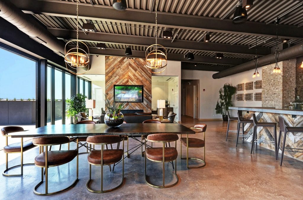 Industrial mid-century modern open living space by Decorilla designer, Wanda P.