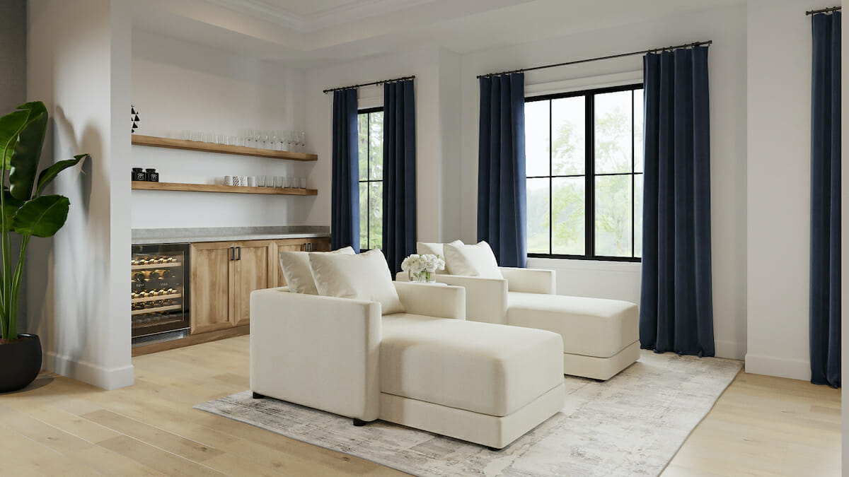 Sitting area in a master bedroom by Decorilla designer, Tiara M.