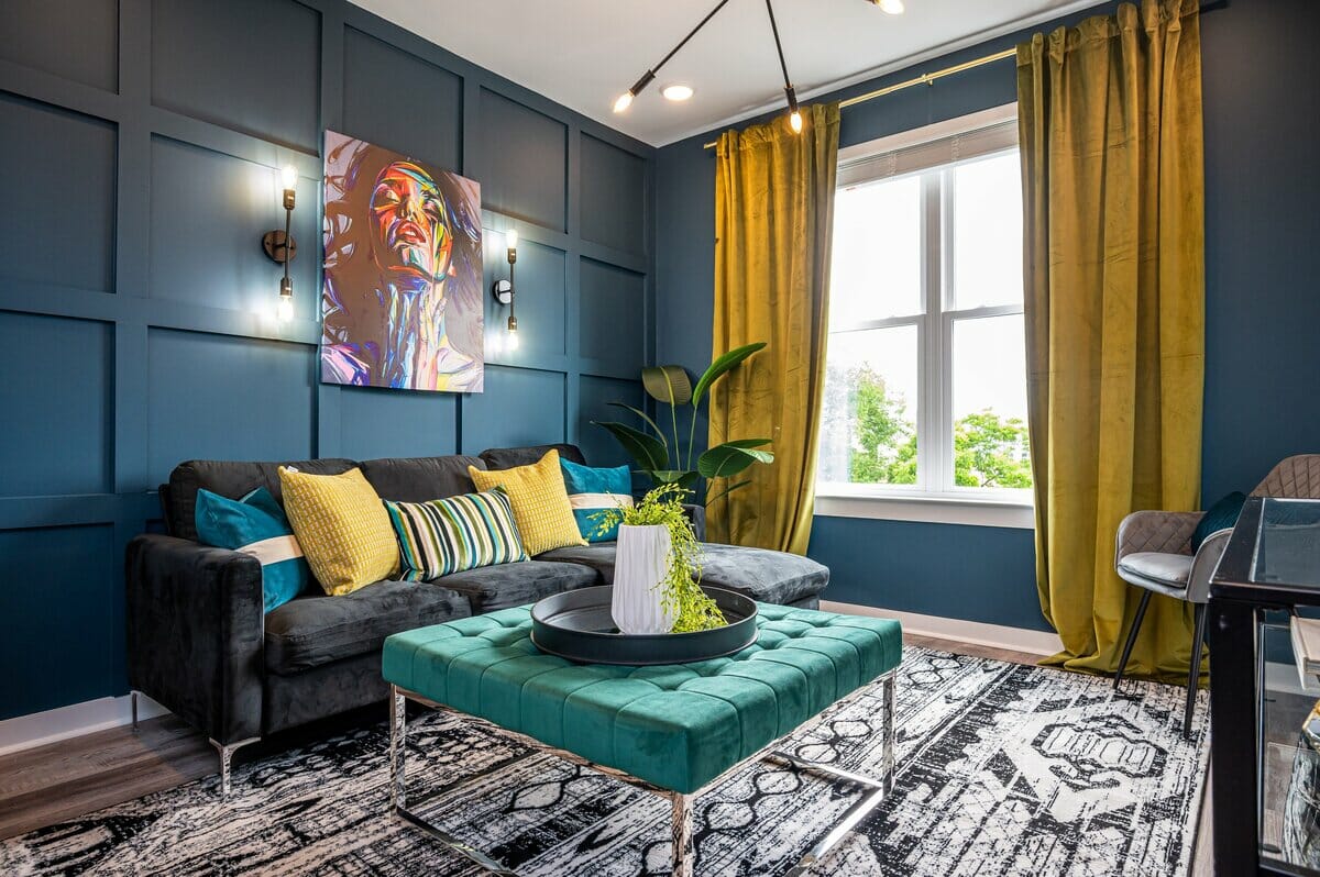 Jewel tone colors in the eclectic living room by Decorilla designer Deidre B