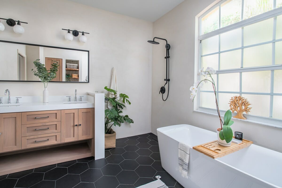 Bathroom designs 2023 highlight geometric shapes like this interior by Carla A