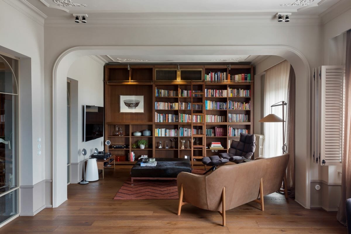 Living room design ideas with a media center library corner by Decorilla designer Meric S