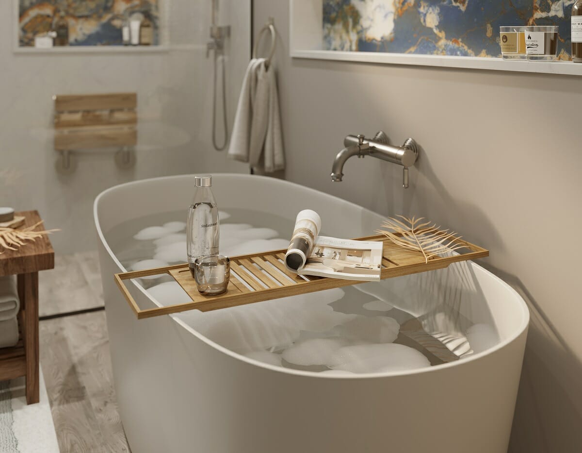 Trendy tub in a home with 2023 bathroom trends by Maya M