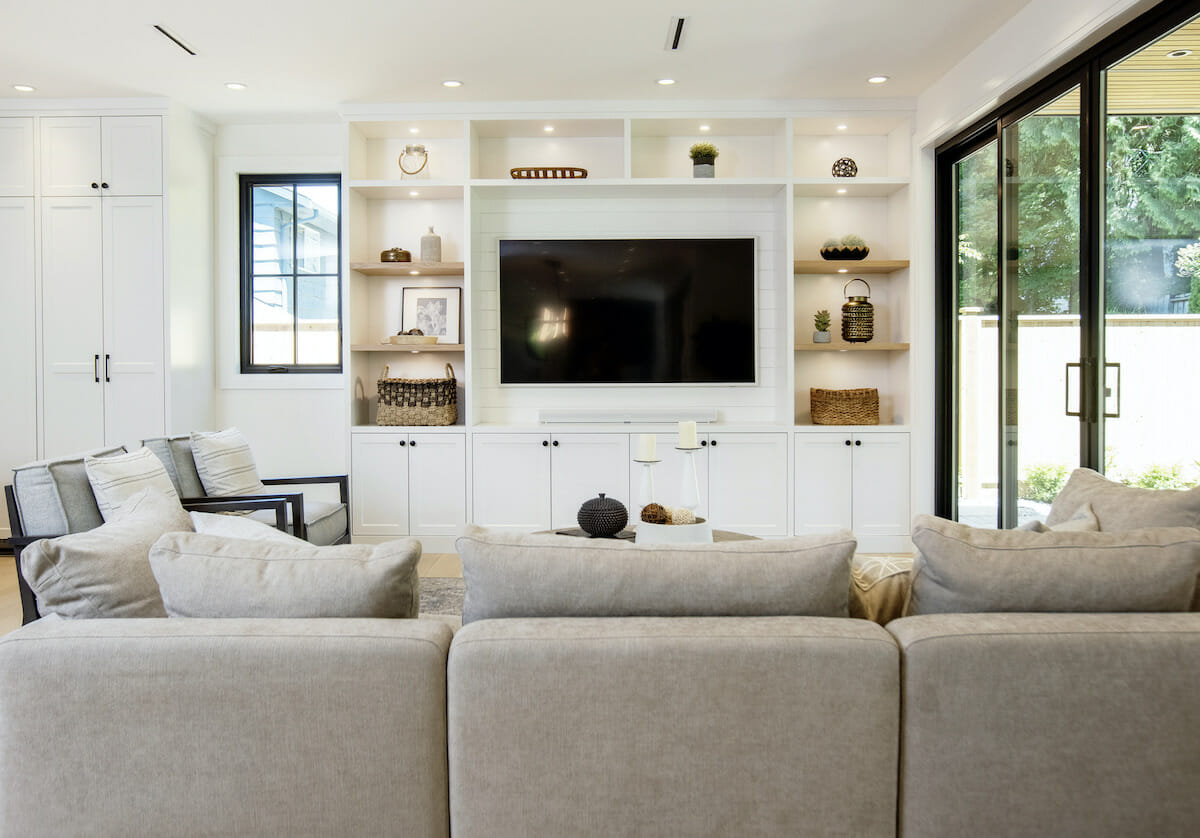 Built in cabinets for a family room by Decorilla designer, Dina H