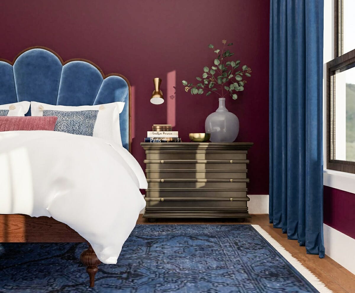 Dark jewel tone blue in a bedroom by Aimee M
