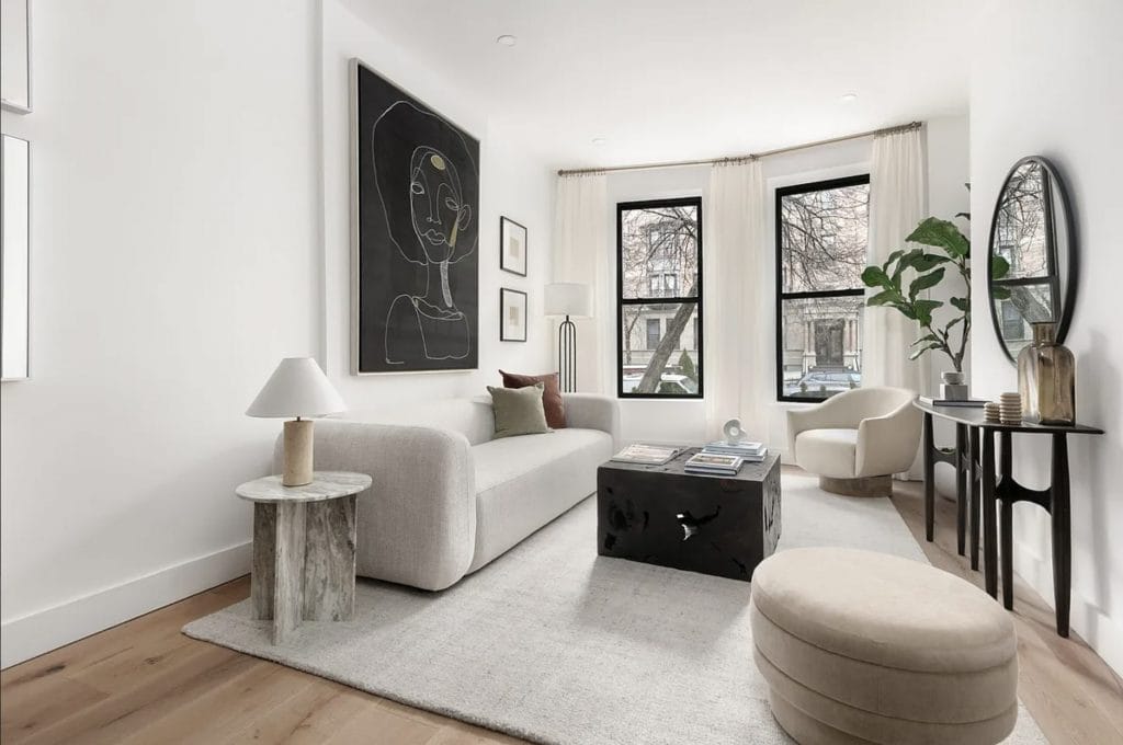 Coffee table decor in a living room by Decorilla designer, Leanna S.