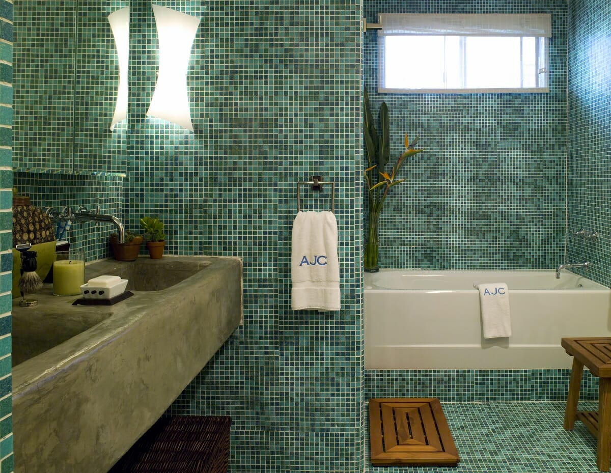 Earth tone bathroom in teal color scheme by Lori D