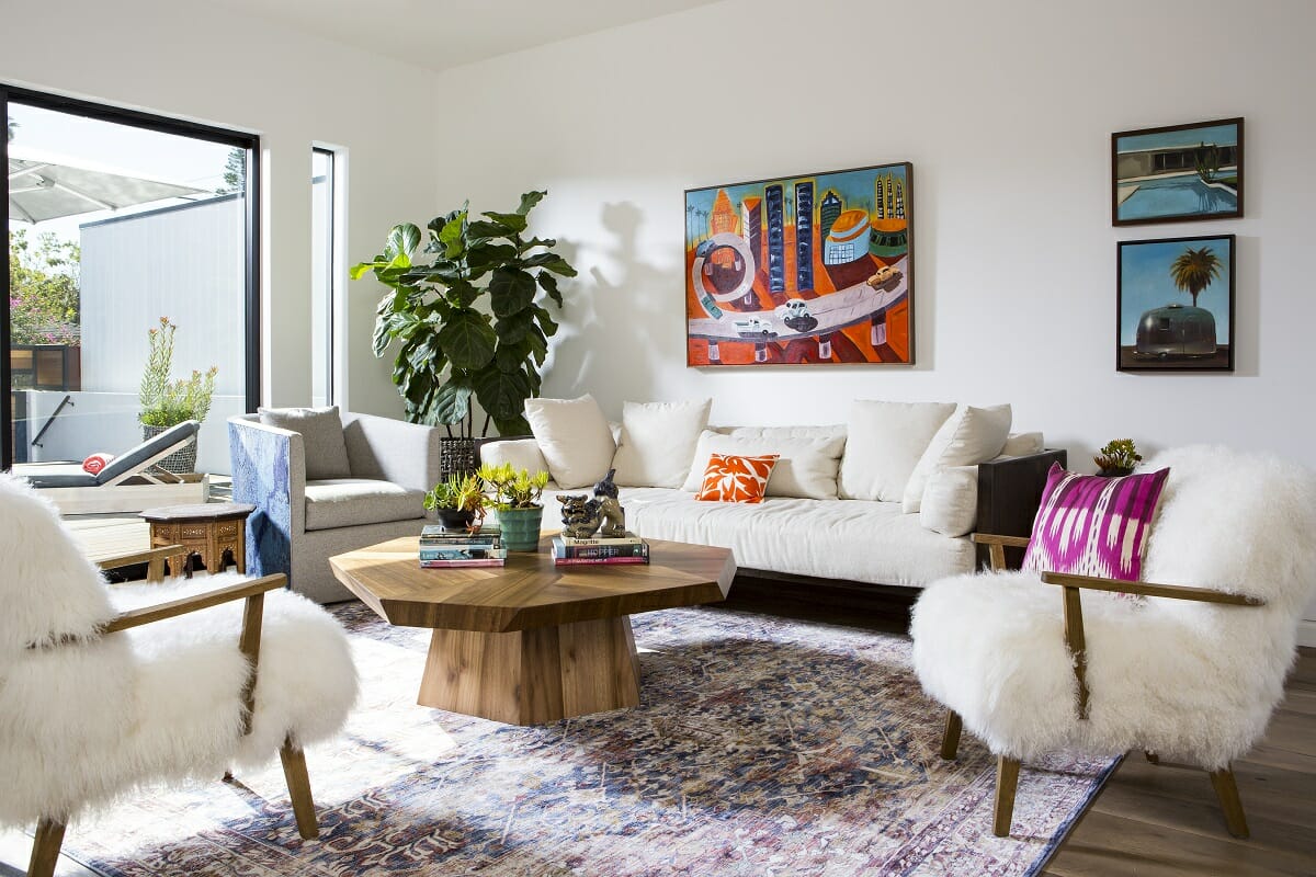 How to decorate a round coffee table with books and decor by Lori D